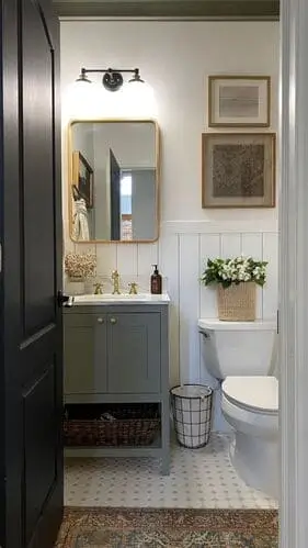 Bathroom vanity in dusty blue, sage green, or mushroom creating a calming and stylish focal point for modern bathroom design.