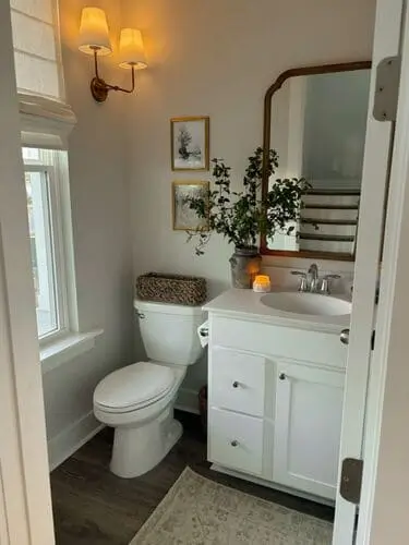 Add vintage decor to a narrow bathroom that brings a ton of character without overhauling your space