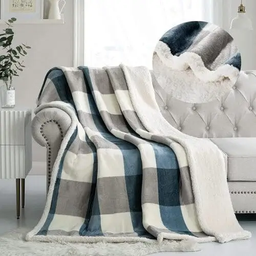 Tasteful blue and cream plaid sherpa throw blanket to include in movie night Christmas basket for men