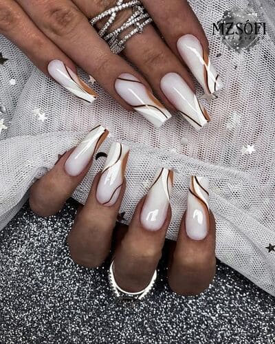 Elegant white nails with delicate brown accent lines, matte white details, and fine black line accents—chic minimalist nail art inspiration.