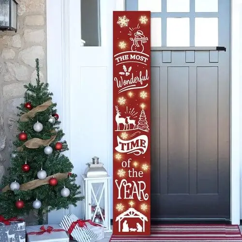 Wooden farmhouse-style Christmas welcome sign at front door, festive holiday touch to greet guests with rustic charm