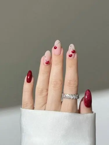 Cherry Vanilla 3D nails with playful, cute designs for a sweet and unique Valentine’s Day manicure.