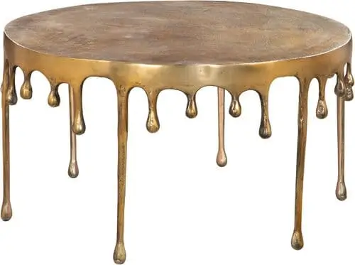 Antique brass drip coffee table for maximalist living room