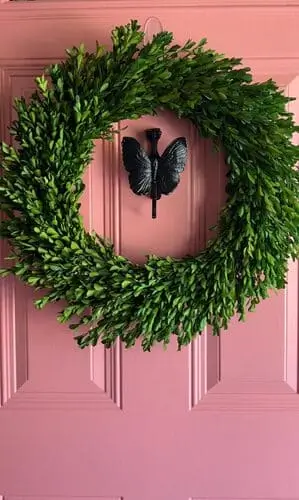 Install a cute door knocker for your apartment front door for a unique touch