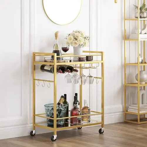 Chic bar cart styled with glassware, bottles, and festive decor for a cute apartment display.