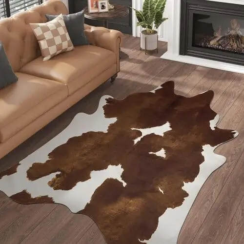 Dark brown faux cowhide rug for retro maximalist living room ideas