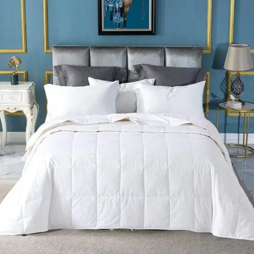 Extra lightweight down duvet ideal for cute apartment decor ideas, offering warmth without weight for a chic bedroom.