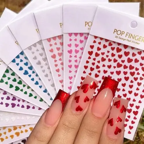 Nail stickers featuring dainty little hearts, perfect for creating a cute Valentine's Day manicure. Available on Amazon for an easy, festive look.