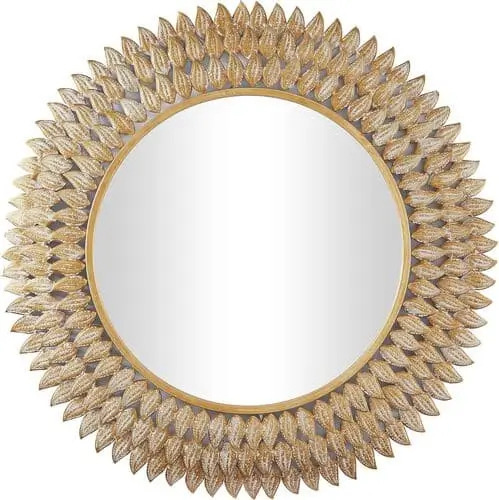 Large gold sun mirror is a beautiful accent for maximalist living room