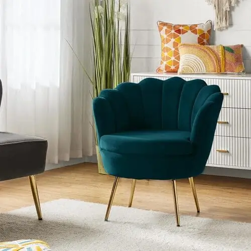 Teal velvet accent chair for pink and teal maximalist living room you can easily recreate in your home