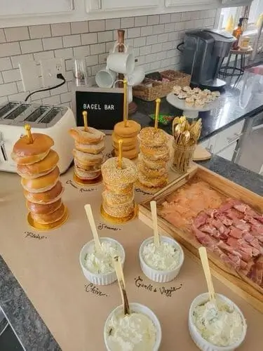 For a fun Valentine's brunch idea, set up a bagel bar! It's a great way to feed a group of guests, and everyone can make their bagel exactly how they like it. 