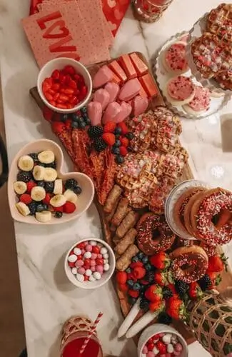 A breakfast board is the perfect way to host a breakfast for guests on valentine's day