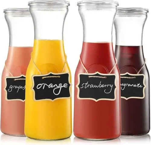 Use carafes for fresh juices in your valentine's DIY mimosa bar