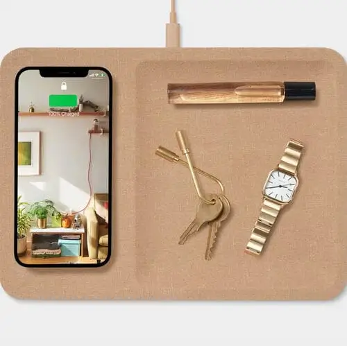 Stylish charging tray in linen or leather finish, a sleek and functional gift for organizing tech accessories and charging devices, perfect for viral TikTok trends.