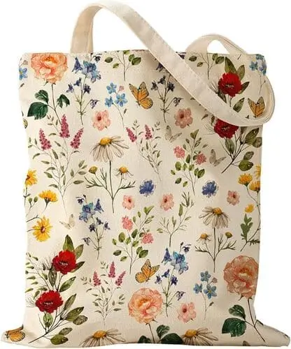 Cottagecore canvas tote bag with a field flower design, perfect for farmer’s market trips and dreamy aesthetic vibes.